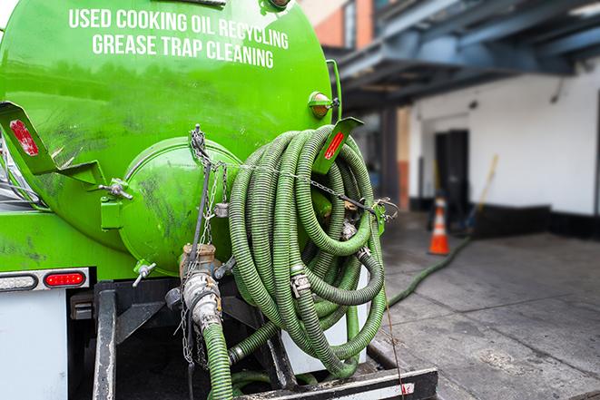 routine pumping of grease trap at a cafeteria in Ashley